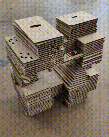 Animation of several layered cardboard prototypes of the Aksala sculpture form